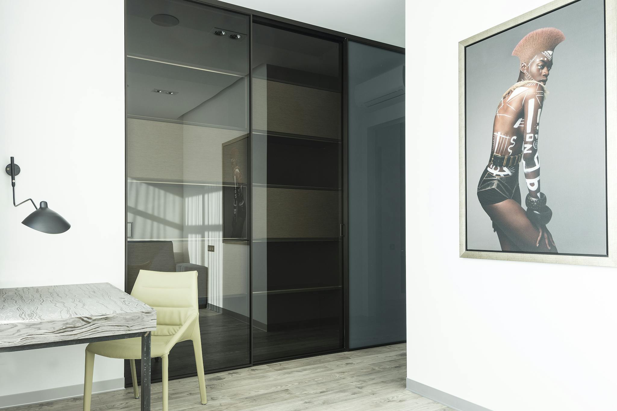 A cozy, modern home office with stylish decor and minimalistic design elements.